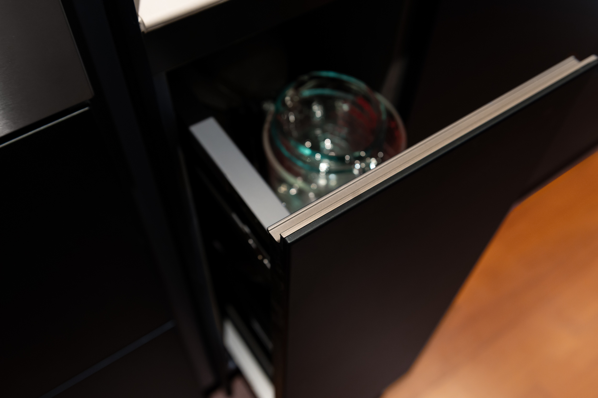 Open drawer with organized kitchen storage